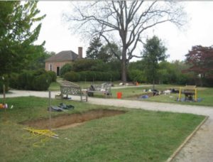 A northwest view across the East Garden during Pogue’s 2013 excavation, with the 15ft-trench (units 567-569) in foreground and the 30 ft-trench (units 570-575) in the background. Photo credit: Dennis Pogue (2013).