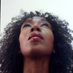 Photo from below of woman with curly hair